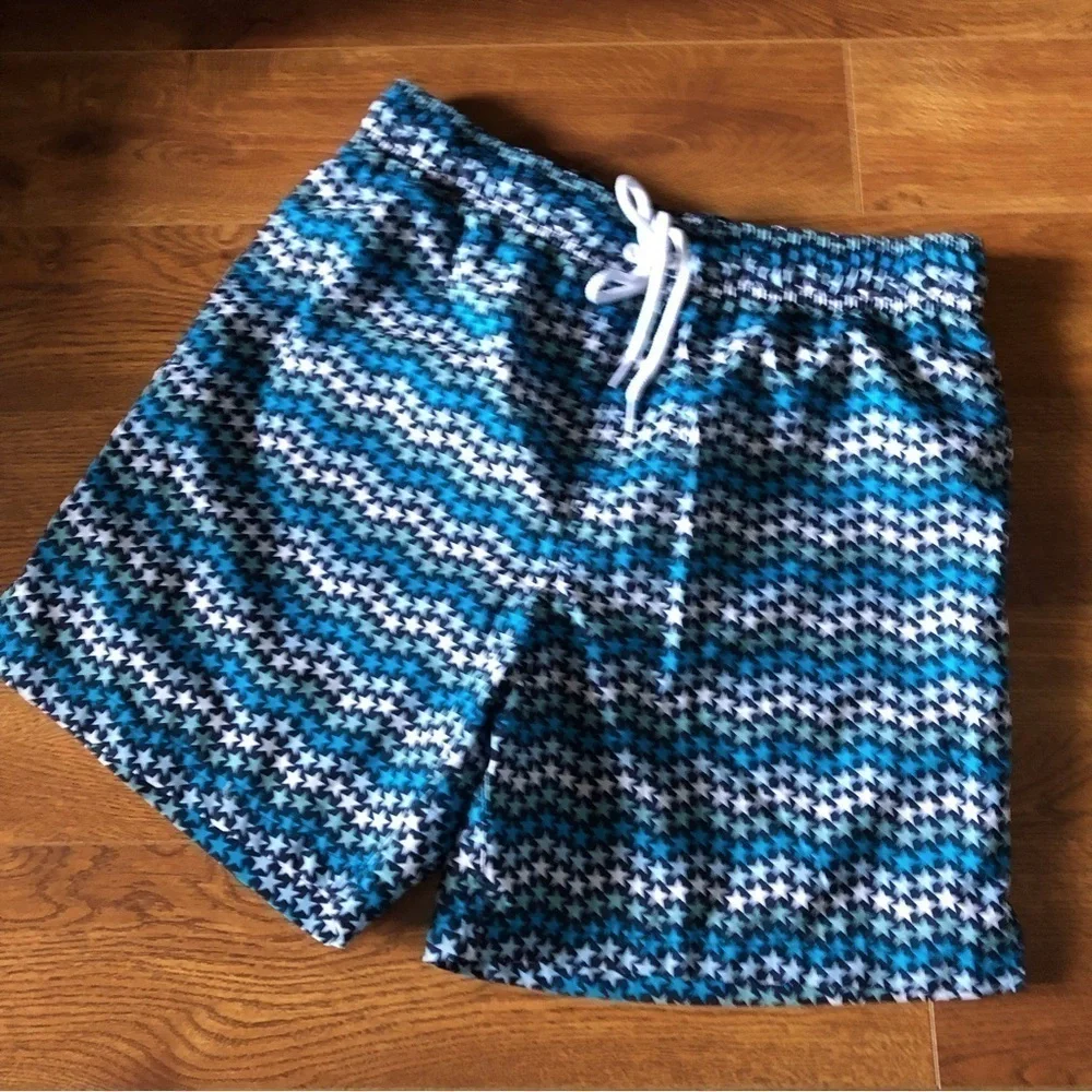 George blue striped star pattern swim trunks in size M (32-34)